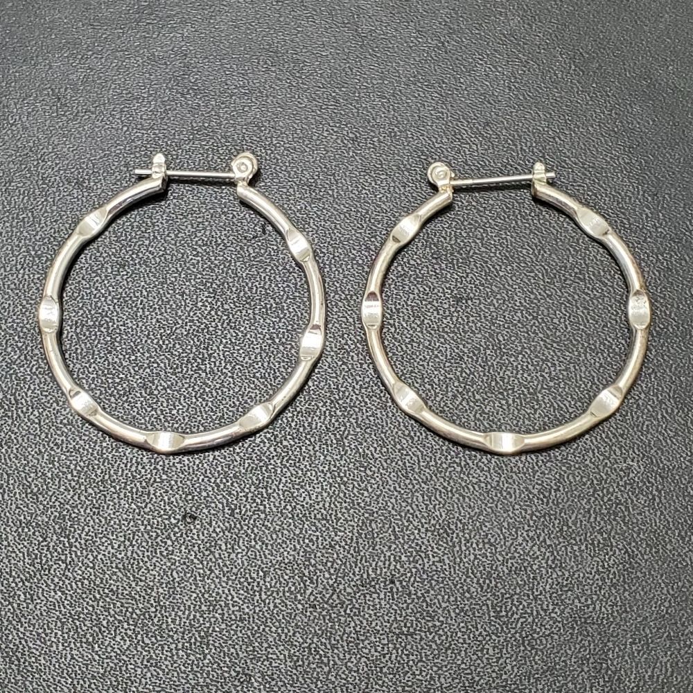Silver tone hoop earrings